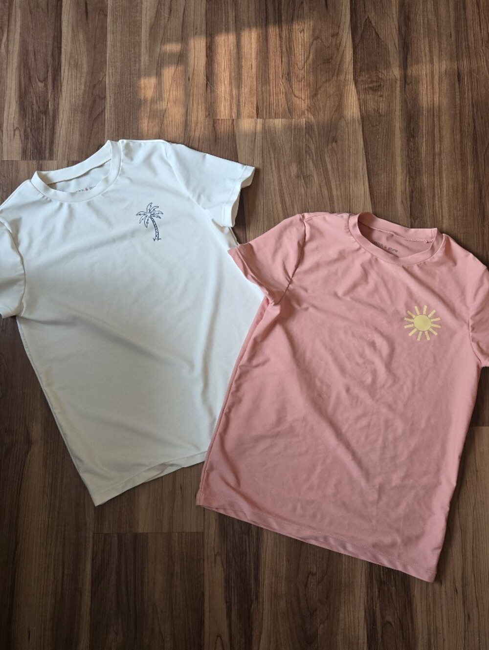 Kids size 10 VGUC set of two Short Sleeve Rashguards Cream & Pink